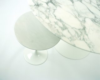Arabescatto and White Extra-topped Saarinen Dining and Side Tables. Photograph by Ilan Rubin.