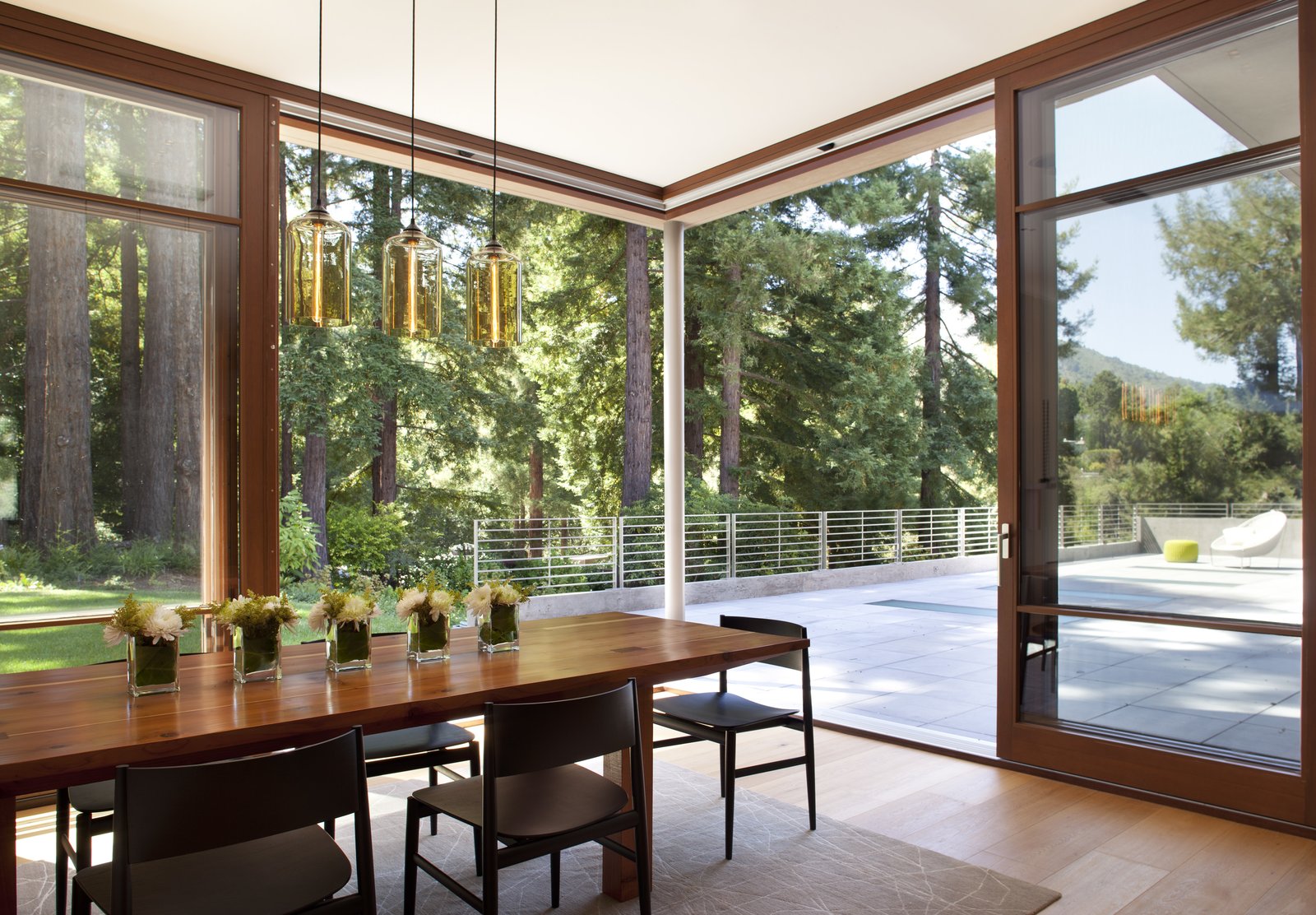 Dining room with intimate connections to groves of redwood trees