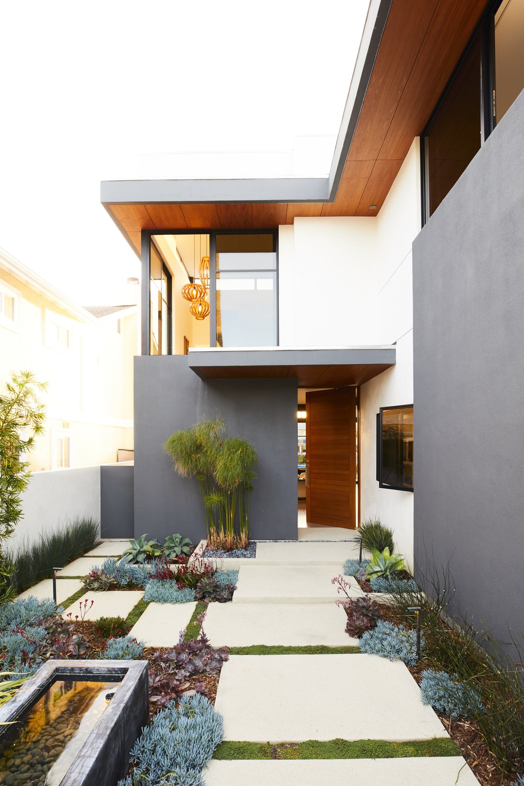 Lanscape designer Jack Kiesel opted to use succulents in the front garden for their low water use, a plus in Southern California, and also for their aesthetics.