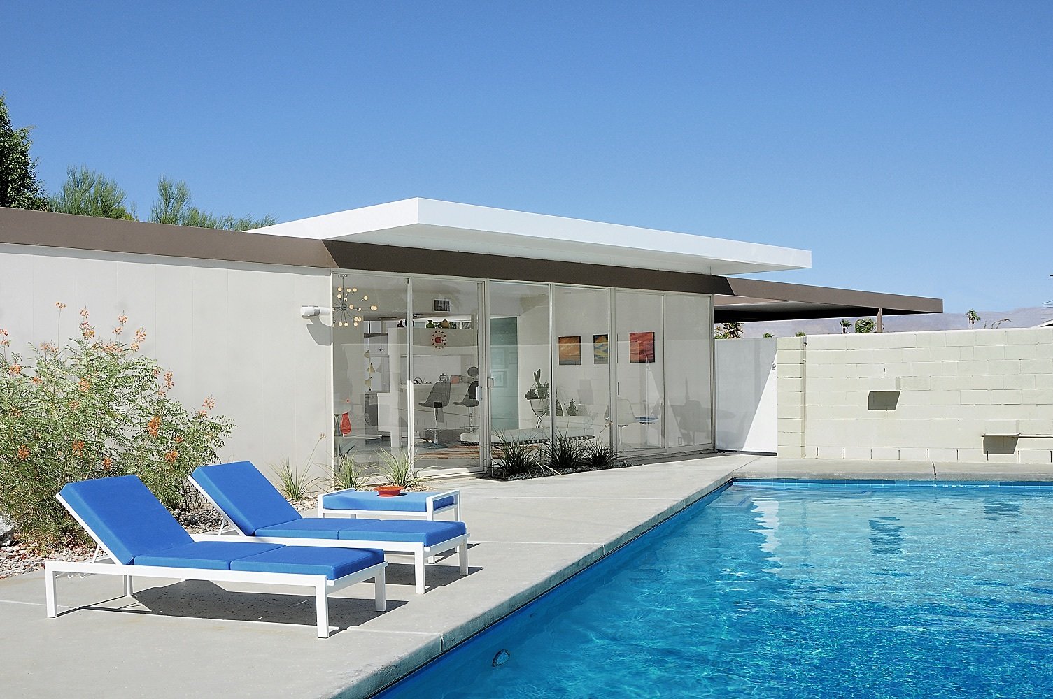 You Can Now Buy One of Palm Springs's Most Historic Homes For 9K Natural light is a given in this home, since each major room features floor-to-ceiling glass panels and sliding doors that are all eight feet high.
