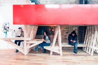 Spotlight on Work Spaces That Double as Art Galleries - Photo 1 of 4 - The Con Artist Collective accommodates both artist studio space and art storage with innovative structures.