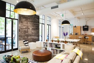 Spotlight on Work Spaces That Double as Art Galleries - Photo 4 of 4 - Designworks' office - formerly an art gallery in downtown Auckland - honors its past by keeping with an open floor plan and abundant natural light. 