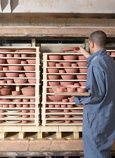 Sausalito Dinnerware Factory Tour - Photo 27 of 35 - The pieces are stacked like a puzzle, using kiln furniture, into our top-hat kilns.