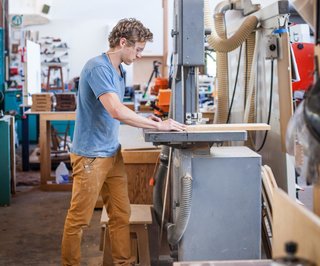 Jacob May Design - Photo 2 of 7 - Dave splits his time in his workshop making new designs for custom buildouts, furniture, and retail clients as well as developing ideas for his product line.