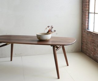 Jacob May Design - Photo 4 of 7 - Made with constantly moving city dwellers in mind, Dave developed the Nomad table (shown here in Natural Walnut) which conveniently packs down for easy travel. 