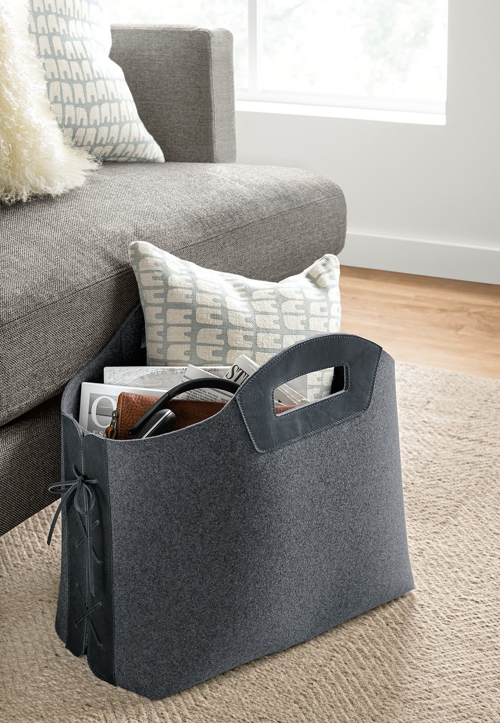 How to Use Modern Home Decor in Unexpected Ways - Photo 2 of 9 - Use an unusual basket or tote as both an organizational tool and statement piece. The tote stands upright so you can easily place it next to your sofa or under your desk.