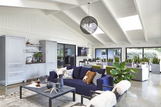 Oasis sofa, Rand cocktail table, Filigri rug, Lira chairs, Sheepskin rugs 
