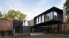 The house’s simple form was conceptualized as a series of stacked boxes, with public spaces residing on the ground level and private spaces in the boxes above. In plan, the boxes are oriented in a u-shape configuration to create a generous private courtyard which was designed as an extension of the interior living space, blurring the boundaries between indoors and out.
#exterior #wood #bauhaus #courtyard #kansascity #baulinderhaus #hufft
Photo credit by Mike Sinclair
Photo of BauLinder Haus modern home
