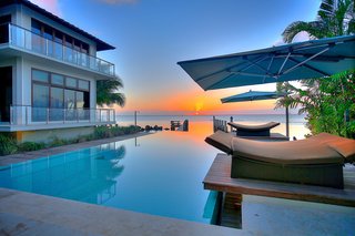 Private Oceanfront Vistas: Designed by Deborah DeLeon of Village Architects, this example of modern island fusion is an exclusively private estate. Showcasing magnificent downtown Miami views, escape to this inspiring contemporary waterfront home. Presented by ONE Sotheby's International Realty.
