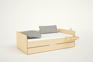 The Cabin Daybed also comes with additional features such as sliding drawers below the bed and a hanging tray. 