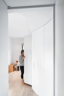 Seldom-needed stuff (luggage, winter clothes, etc.) is stashed in high built-in storage cabinets in the childrens' bedroom.