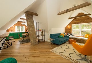 10 Bright and Airy Modern Attic Renovations - Photo 3 of 10 - The salvaged floors are a blend of reclaimed antique hardwoods.