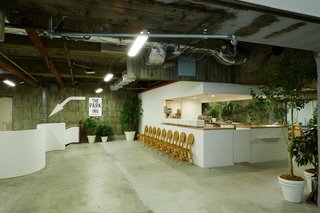 9 Inspirational Examples of Adaptive Reuse - Photo 8 of 9 - A cafe and record shop welcome visitors to the first level on the subterranean shopping experience Park-Ing Ginza.