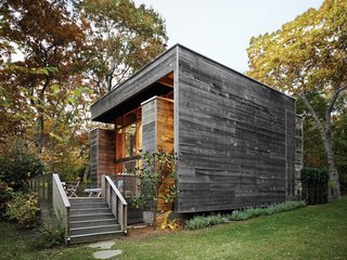 Bates Masi’s renovation and expansion of Harry Bates’ 1967 house in Amagansett, New York, salvaged much of the home’s original cypress decking and incorporated subtle additions to the exterior. Because cypress quickly develops a patina, it was only a matter of weeks before the new facade matched the color of the original wood siding. 