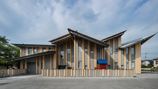 Architect Spotlight: 12 Works by Japanese Architect Kengo Kuma - Photo 5 of 12 - The multiple pitched roof design of Aitoku Kindergarden reflects the city scape—with each angled roof expressing the natural rhythm of a town. 