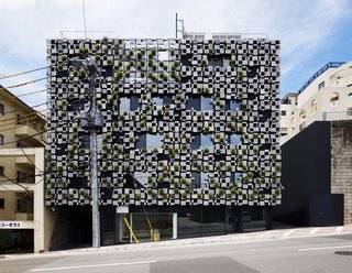 Architect Spotlight: 12 Works by Japanese Architect Kengo Kuma - Photo 7 of 12 - Irrigation and ventilation systems have been installed behind the panels so that the facade can accommodate the building's comprehensive system.