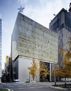 Architect Spotlight: 12 Works by Japanese Architect Kengo Kuma - Photo 4 of 12 - The external walls of the LVMH headquarters in Osaka were fabricated from onyx plates sourced from Pakistan, which were sliced down to four millimeters thick before being sandwiched between glass plates. 