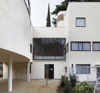 Spotlight on 10 Influential Works by Le Corbusier - Photo 1 of 10 - Villa Roche exemplifies Le Corbusier’s modern approach to housing. Designed as a residence for Swiss banker Raoul La Roche, the Villa also served as an exhibition space for Mr. Roche’s avant-garde collection of art—which beautifully integrating its purpose as both a residence and gallery space. Maison La Roche was designed in collaboration with Le Corbusier's cousin Pierre Jeanneret and is connected to Maison Jenneret. Both were named UNESCO Heritage Sites. 