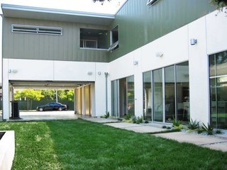 Eco-Friendly Prefabs and the Modern Mobile Home: Spotlight on Jennifer Siegal - Photo 9 of 14 - The concept for the project centers around educational, environmental, and fiscal responsibility. The 3,600-square-foot, two-story prefabricated house sits on a flat lot in an L-shape configuration.