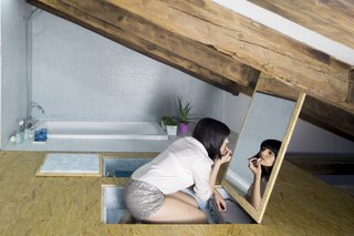 Gestalten's New Book Shows How to Transform Small Spaces Into Design Marvels - Photo 5 of 16 - The bathroom in the bedroom loft of this Spanish apartment by Elil sneaks a sunken bath as and extra storage for toiletries and a vanity mirror into the floor. 