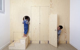 Gestalten's New Book Shows How to Transform Small Spaces Into Design Marvels - Photo 6 of 16 - For this family home in Geneva, architect Aurelie Monet Kasisi designed a series of bookshelves that act as walls. dividing two large rooms into four smaller ones. 