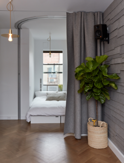 Gestalten's New Book Shows How to Transform Small Spaces Into Design Marvels - Photo 7 of 16 - This 350-square-foot prototype house designed by Graham Hill, the founder of the eco-lifestyle website Treehugger, features a guest room that can also be transformed into an office or a bar—then discretely concealed behind a gray felt curtain that offers guests privacy. 