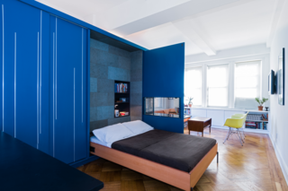 Gestalten's New Book Shows How to Transform Small Spaces Into Design Marvels - Photo 10 of 16 - MKCA's (Michael K. Chen Architecture) refurbishment of this 420-square-foot apartment literally unfolds. Instead of dividing the unit into smaller spaces, he used a single piece of furniture to reconfigure and subdivide the space. 