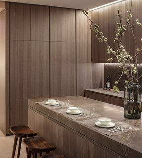 A Look Into NYC's 152 Elizabeth Street, Tadao Ando's First Residential Project Outside of Asia - Photo 4 of 9 - The kitchen offers enhanced flexibility with a custom sliding Fango marble countertop by the Italian brand Minimal. 