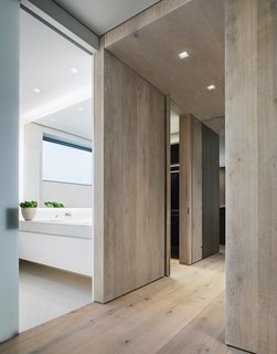 A Look Into NYC's 152 Elizabeth Street, Tadao Ando's First Residential Project Outside of Asia - Photo 7 of 9 - The flooring is comprised of wide-plank Danish oak from Dinesen, which is also featured in select wall panels and used to create the thick, full-height doors to the master bedroom.