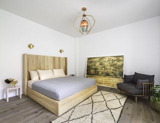 Formerly Home to Superman, The Standish Offers Modernized Beaux-Arts Condos From $1.3 Million - Photo 6 of 8 - The master bedroom includes a stunning multicolor glass lighting fixture by New York-based lighting and product designer Bec Brittain, which creates a soothing ambiance and an artistic focal point in the room.