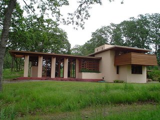 10 Frank Lloyd Wright Homes Available to Rent Right Now - Photo 5 of 10 - The only residence in Oregon by Wright, the Gordon House was designed in 1957 for Evelyn and Conrad Gordon and finished in 1963 (four years after Wright’s death). Originally located adjacent to the Willamette River near Wilsonville, the home is now located within the Oregon Garden, in Silverton, Oregon. When its 2001 owners planned to tear it down, the Frank Lloyd Wright Conservancy obtained a three-month reprieve to dismantle and relocate it. The house, an example of Wright's Usonian vision for America, opened one year later and is the only publicly accessible Frank Lloyd Wright home in the Pacific Northwest.