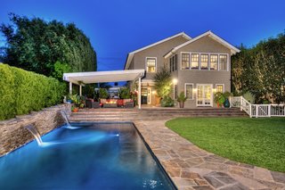 On the Market For $4.5M, This Venice Beach Compound Captures the Essence of Indoor-Outdoor Living - Photo 8 of 8 - The 2,000-square-foot ipe deck off the main house overlooks a sleek 40-foot ozone pool.
