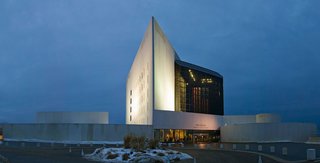 Built to commemorate John F. Kennedy, the library and museum contains papers and materials from his time in office and educates the public about the life of the 35th president. Pei was chosen by the Kennedy family to lead the project after JFK was assassinated in 1963, but setbacks and a change of location delayed the completion. With a commanding view of the Boston waterfront, the austere building comprised of Pei's signature geometric shapes in concrete, steel, and glass and serves as a fitting monument to the former president. Pei is said to consider the John F. Kennedy Library "the most important commission" of his life.
