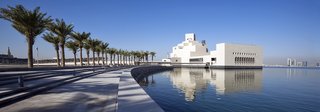 Standing apart on the waters of the Corniche in the Qatari capital Doha, the Museum of Islamic Art draws influence from traditional Islamic architecture. A glass curtain wall on the north side offers panoramic views from all five floors of gallery space, and the structure—which is made of limestone and captures hourly changes in light and shade—has become an iconic presence in the region.