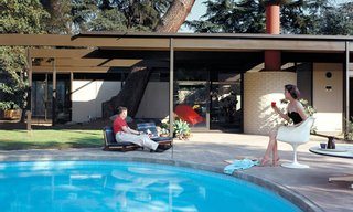 A Look at 10 Iconic Case Study Houses in California - Photo 4 of 10 - Saul and Dr. Ruth Bass poolside at Case Study House #20B in Altadena, California, 1958.