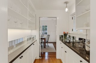 With an Architectural Pedigree and Green Certification, This Pasadena Home Just Listed For $3.6M - Photo 2 of 10 - A butler's pantry leads from the kitchen area to the dining room. 