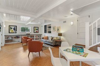 With an Architectural Pedigree and Green Certification, This Pasadena Home Just Listed For $3.6M - Photo 5 of 10 - At the basement level, there is an additional family room with a half bath and access to the covered patio and gardens.