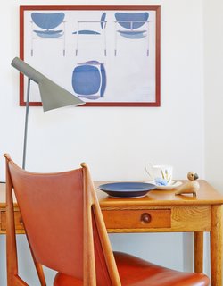 Get Your Fix of Midcentury Scandinavian Design at This Copenhagen Hotel - Photo 5 of 8 - Finn Juhl's Egyptian chair is paired with a Lady Writing Table by Hans J. Wegner. The desk lamp is by Arne Jacobsen.