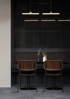 Spotlight on Multidisciplinary Danish Design Studio, Norm Architects - Photo 7 of 11 - "With an interior design defined by an array of stone, wood, and metal, the materials are all natural and have deliberately been altered in order to create dark and industrial surfaces that match the mood of the place," explains the architects.