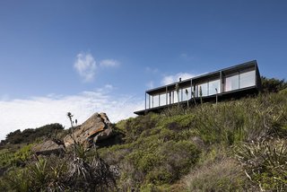 Casa Remota is a design prototype for a transportable, modular dwelling. The 861 square-foot home can be constructed in 45 days, transferred to its location in four hours, and installed in only six more. Erected near the Chilean city of Valparaíso, the two-bedroom, two-bathroom home has floor-to-ceiling windows to enjoy views of the region’s dramatic coastline.