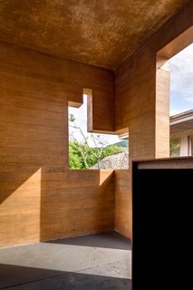 This Expansive Beachside Home on Mexico's Pacific Coast Puts a Modern Spin on Tradition - Photo 8 of 13 - Cutouts allow sea breezes to flow through non-air-conditioned spaces.