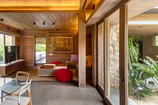 This Expansive Beachside Home on Mexico's Pacific Coast Puts a Modern Spin on Tradition - Photo 10 of 13 - The material palette includes naturally finished local parota wood and rough-cut stone.