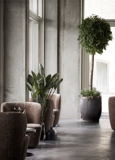 Spotlight on Multidisciplinary Danish Design Studio, Norm Architects - Photo 8 of 11 - Floor-to-ceiling windows offer views of the canal and the old city center beyond. 