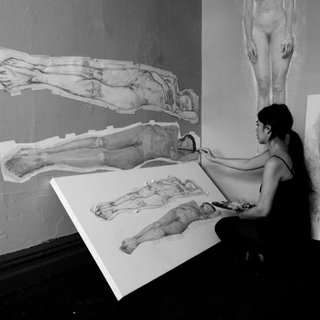 Art and Design Come Together in These 10 Examples of Inspirational Wall Murals - Photo 5 of 12 - Shown here is Andrea Clinton working hard on a piece in Room 8B.