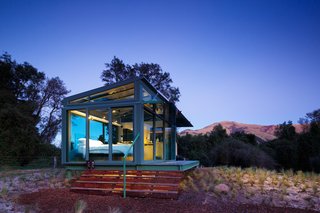8 Unique Vacation Rentals Around the World - Photo 5 of 16 - This state-of-the-art living capsule on New Zealand’s South Island features glass roofing, flooring, and walls to provide the ultimate panoramic view of the wilderness.