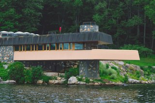 A Home on a Private Island That's Based on a Frank Lloyd Wright Design Is on the Market For $14.9M - Photo 2 of 14 - Signature Wright details include the home's integration into the site's natural surroundings.