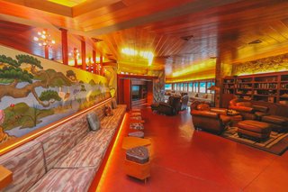 A Home on a Private Island That's Based on a Frank Lloyd Wright Design Is on the Market For $14.9M - Photo 7 of 14 - The main house features African mahogany woodwork based on Wright’s specifications.