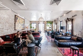 A New Experiential Hostel in Austin Offers Unique Lodging in a Restored Railway Hotel - Photo 2 of 16 - A cafe and parlor offers a co-working space for both guests and locals during daytime hours. <span style="color: rgb(204, 204, 204); font-size: 13px;">Casey Chapman</span>