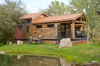Test Out Tiny House Living at One of These Nature-Immersed Cabin Resorts - Photo 1 of 14 - Caboose Cabin 