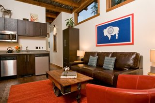 Test Out Tiny House Living at One of These Nature-Immersed Cabin Resorts - Photo 7 of 14 - Full kitchens and fireplaces make guests feel right at home. 
